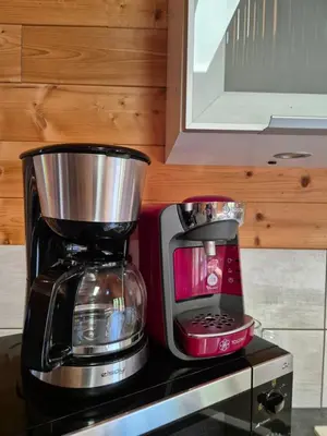 Cuisine ou kitchenette dans l'établissement Les Cottages de Charme