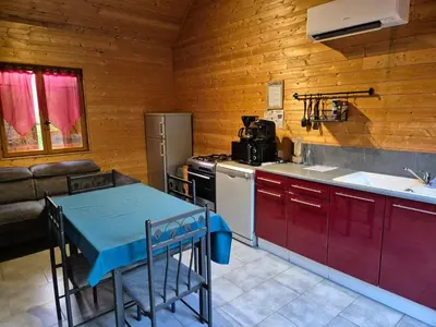Cuisine ou kitchenette dans l'établissement Les Cottages de Charme