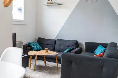 Coin salon dans l'établissement Spacieux & Familial 3 chambres proche gare