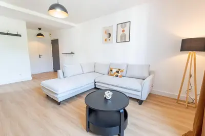 Coin salon dans l'établissement LE CHOEUR DE FRANCUEIL - T2 avec vue