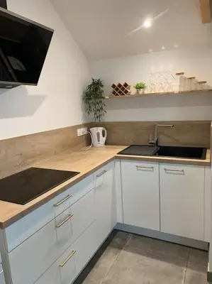 Cuisine ou kitchenette dans l'établissement Logement T2 indépendant 10 mn Angers
