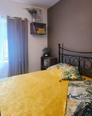Un ou plusieurs lits dans un hébergement de l'établissement La Maison des Oiseaux