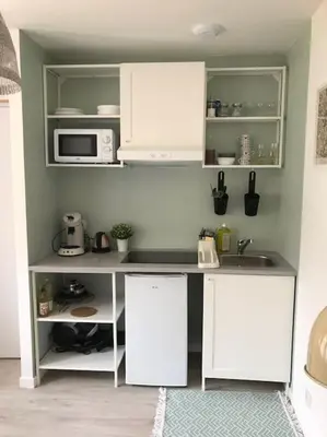 Cuisine ou kitchenette dans l'établissement Studio Menthe à l'eau - Avec extérieur - Futuroscope 20min