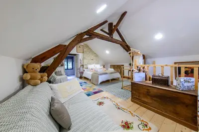 Un ou plusieurs lits dans un hébergement de l'établissement Laureanna - Maison avec jardin de 1000 m2