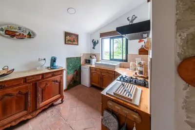 Cuisine ou kitchenette dans l'établissement Laureanna - Maison avec jardin de 1000 m2