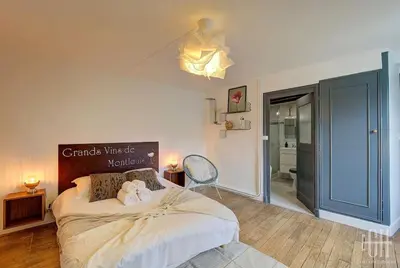 Un ou plusieurs lits dans un hébergement de l'établissement Grand Appartement - Proche Bord de Loire - Wifi