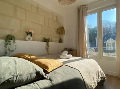 Un ou plusieurs lits dans un hébergement de l'établissement Duplex cinéma - centre historique Tours