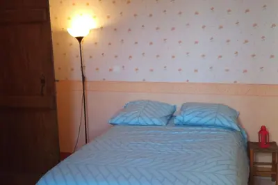 Un ou plusieurs lits dans un hébergement de l'établissement La maison paisible au village