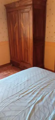 Un ou plusieurs lits dans un hébergement de l'établissement La maison paisible au village