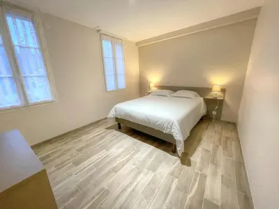 Un ou plusieurs lits dans un hébergement de l'établissement Gîte élégant avec climatisation, jardin et Wi-Fi près des Châteaux et Zoo de Beauval - FR-1-491-453
