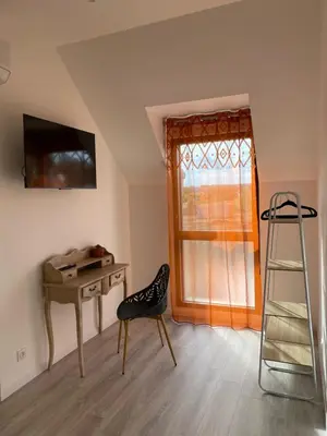 Télévision ou salle de divertissement dans l'établissement Domaine du Saugé
