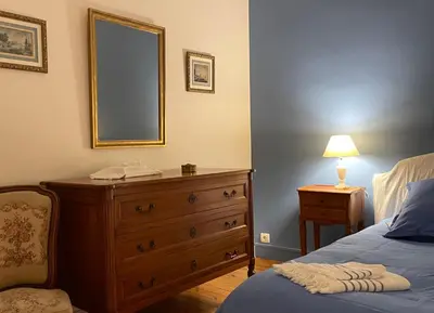 Un ou plusieurs lits dans un hébergement de l'établissement Maison de famille de charme en pleine nature en bord de rivière à 20 min d'Angers