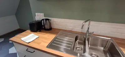 Cuisine ou kitchenette dans l'établissement Appartement spacieux centre ville parking privé