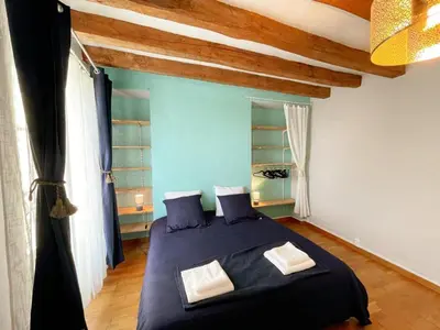 Un ou plusieurs lits dans un hébergement de l'établissement Gîte tout confort avec garage et WIFI à Preuilly-sur-Claise - FR-1-381-596