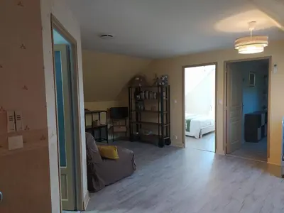 Coin salon dans l'établissement Des Roux et des Pious Suite de 35 à 60 m2 et 3 chambres pour groupe de 2 à 6 personnes
