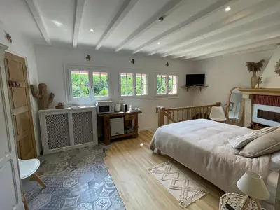 Un ou plusieurs lits dans un hébergement de l'établissement Le Petit Nid du Vieux Logis Ravissante Suite dans vallée troglodyte