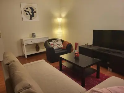 Coin salon dans l'établissement Appartement de l'Étoile