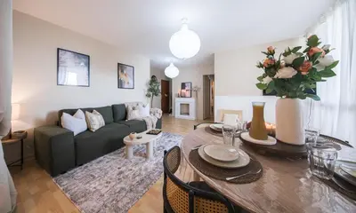 Coin salon dans l'établissement Appartement avec Rétroprojecteur, Babyboot avec belle vue et proche gare