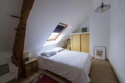 Un ou plusieurs lits dans un hébergement de l'établissement Maison de campagne au Domaine