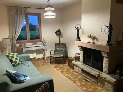 Coin salon dans l'établissement Maison à la ferme Grenetemy