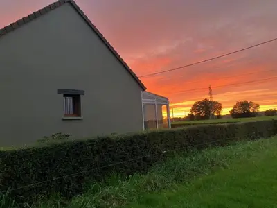 Lever ou coucher de soleil vu de la maison de vacances ou à proximité