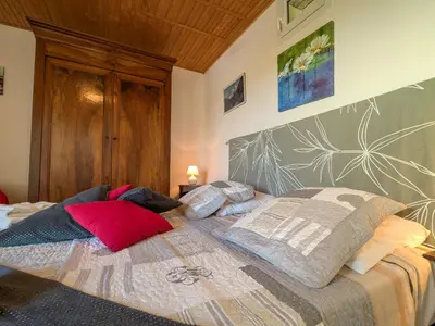 Un ou plusieurs lits dans un hébergement de l'établissement Chambres d'hôtes avec jardin près des châteaux de la Loire - FR-1-591-666