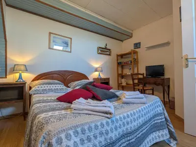 Un ou plusieurs lits dans un hébergement de l'établissement Chambres d'hôtes au calme près des Châteaux et Zoo de Beauval - FR-1-591-686
