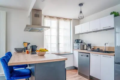 Cuisine ou kitchenette dans l'établissement Le Grand Colbert - By PrestiPlace