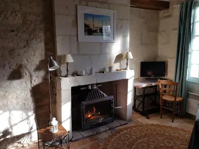 Télévision ou salle de divertissement dans l'établissement Les gîtes de la Madeleine