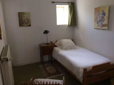 Un ou plusieurs lits dans un hébergement de l'établissement Gîte historique au château de charme proche du Mans - FR-1-410-453
