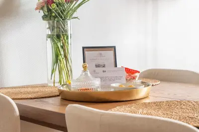 Coin salon dans l'établissement Le Nid du Cygne - By PrestiPlace