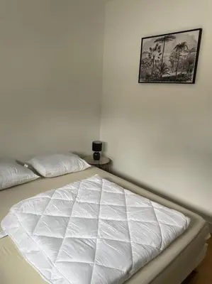 Un ou plusieurs lits dans un hébergement de l'établissement Les Chalets du Mancel Chalet Maïka -Bouleries Jump - 24h du Mans