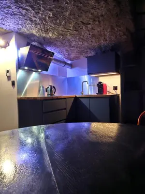 Cuisine ou kitchenette dans l'établissement Troglodyte Loft