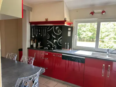 Cuisine ou kitchenette dans l'établissement L'Harmonie Evénements House