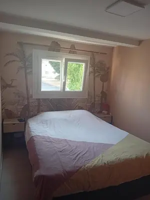 Un ou plusieurs lits dans un hébergement de l'établissement Maison proche du circuit des 24h du Mans