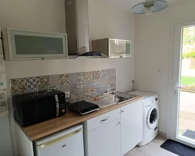 Cuisine ou kitchenette dans l'établissement Logement indépendant