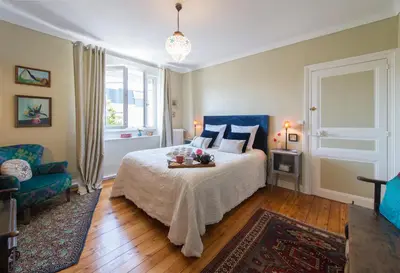 Un ou plusieurs lits dans un hébergement de l'établissement La Mancelle - Chambre d'hôtes