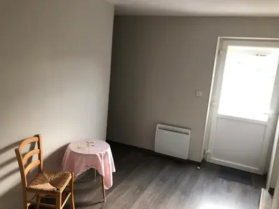 Coin salon dans l'établissement Grande chambre côté jardin