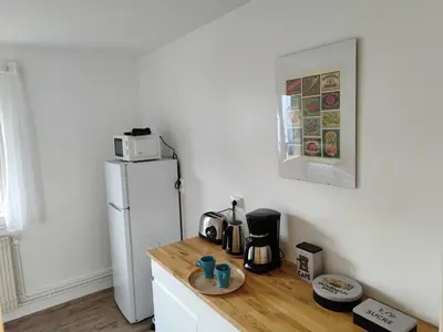 Cuisine ou kitchenette dans l'établissement Séjours des Rossignols