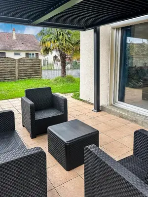 Coin salon dans l'établissement Maison lumineuse, jardin et Wi-Fi gratuit