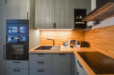 Cuisine ou kitchenette dans l'établissement Le Voltaire - Hypercentre - Netflix