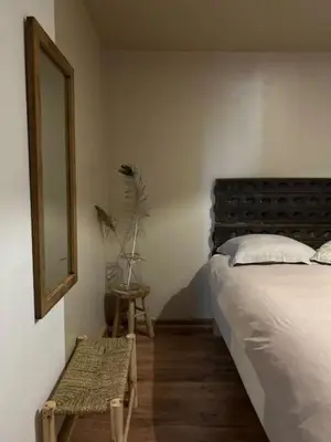 Un ou plusieurs lits dans un hébergement de l'établissement Maison de village sud Touraine avec piscine proche Chinon Azay