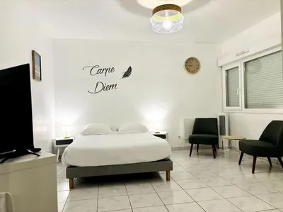 Un ou plusieurs lits dans un hébergement de l'établissement Studio cosy Tours-Sud