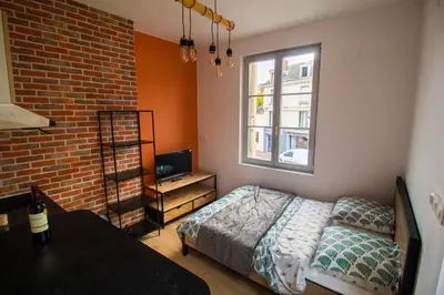 Un ou plusieurs lits dans un hébergement de l'établissement Studios Saint Jacques, Châtellerault
