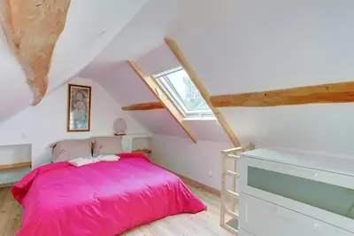 Un ou plusieurs lits dans un hébergement de l'établissement Charmante maison proche Amboise