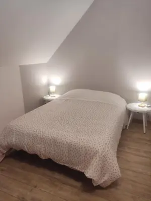 Un ou plusieurs lits dans un hébergement de l'établissement Maison de campagne