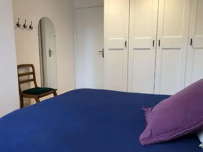 Un ou plusieurs lits dans un hébergement de l'établissement Cosy apartment centre Le Mans 5min train station