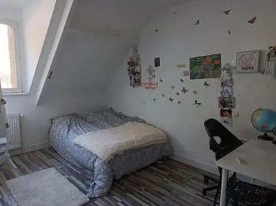 Un ou plusieurs lits dans un hébergement de l'établissement maison face au château