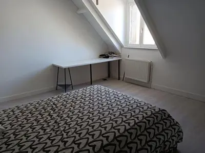 Un ou plusieurs lits dans un hébergement de l'établissement maison face au château
