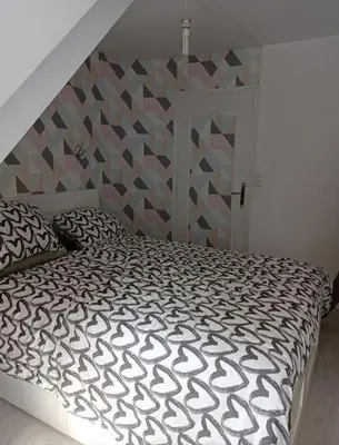 Un ou plusieurs lits dans un hébergement de l'établissement maison face au château